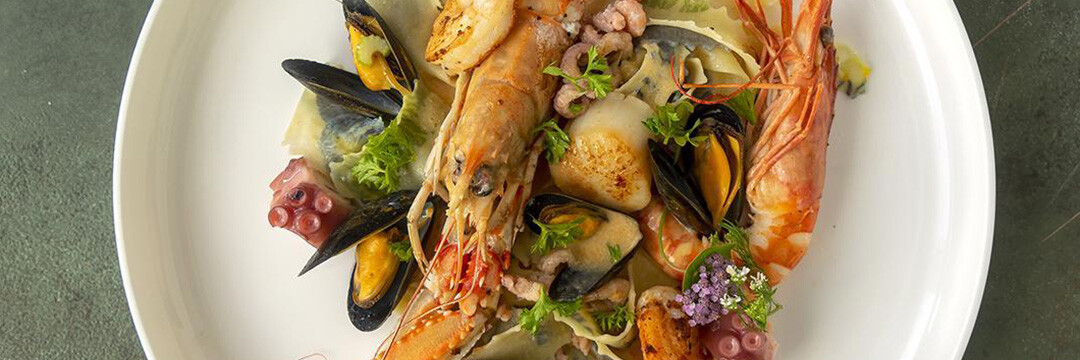 Pâtes frutti di mare avec langoustines, gambas…